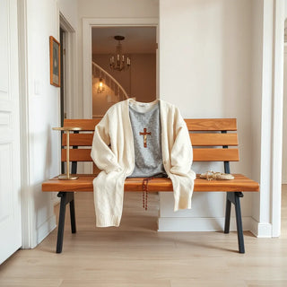 Modest Catholic-themed outfit and rosary arranged on a bench in soft natural light
