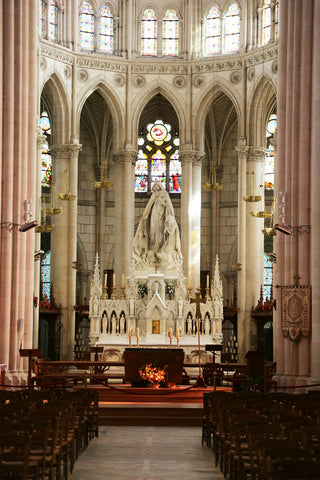white mother mary statue in church