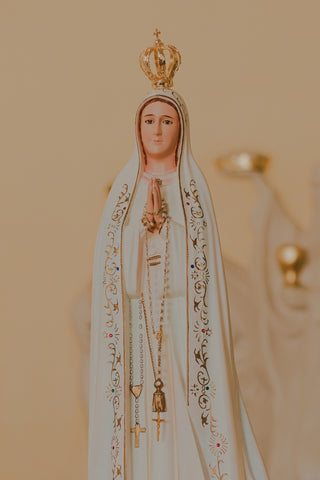 a statue of the virgin mary of guadalupe
