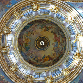 the ceiling of a building with a painting on it