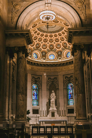 The inside of a church with stained glass windows