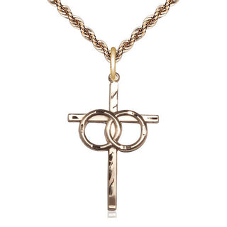 14kt Gold Wedding Rings Cross Medal