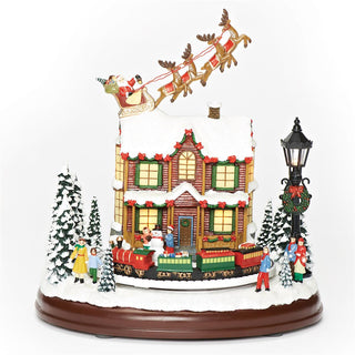 9.25-Inch Lighted Musical Santa Over House And Rotating Train