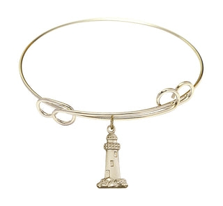 7 1/2 inch Round Double Loop Hamilton Gold Bangle Bracelet with a 14kt Gold Filled Lighthouse charm.
