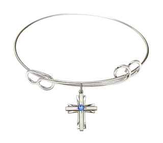7 1/2 inch Round Double Loop Rhodium Bangle Bracelet with a Sterling Silver Cross charm.