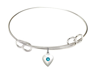 7 1/2 inch Round Double Loop Rhodium Bangle Bracelet with a Sterling Silver Heart charm.