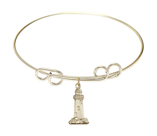 8 inch Round Double Loop Hamilton Gold Bangle Bracelet with a 14kt Gold Filled Lighthouse charm.