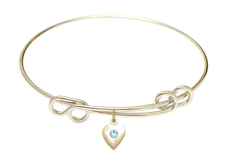 8 1/2 inch Round Double Loop Hamilton Gold Bangle Bracelet with a 14kt Gold Filled Heart charm.