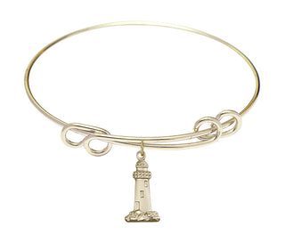 8 1/2 inch Round Double Loop Hamilton Gold Bangle Bracelet with a 14kt Gold Filled Lighthouse charm.