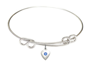 8 1/2 inch Round Double Loop Rhodium Bangle Bracelet with a Sterling Silver Heart charm.