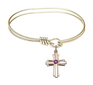 5 3/4 inch Oval Eye Hook Hamilton Gold Bangle Bracelet with a 14kt Gold Filled Cross charm.
