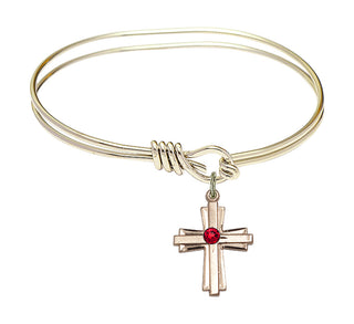 5 3/4 inch Oval Eye Hook Hamilton Gold Bangle Bracelet with a 14kt Gold Filled Cross charm.