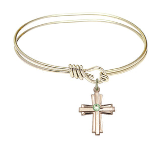 5 3/4 inch Oval Eye Hook Hamilton Gold Bangle Bracelet with a 14kt Gold Filled Cross charm.