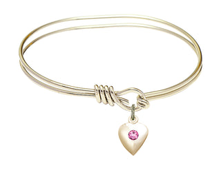 5 3/4 inch Oval Eye Hook Hamilton Gold Bangle Bracelet with a 14kt Gold Filled Heart charm.