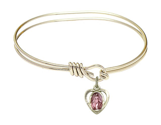 5 3/4 inch Oval Eye Hook Hamilton Gold Bangle Bracelet with a 14kt Gold Filled Miraculous charm.