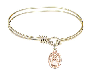 5 3/4 inch Oval Eye Hook Hamilton Gold Bangle Bracelet with a 14kt Gold Filled Saint Pauline Visintainer charm. Engraved Catholic Saint Jewelry