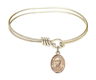 5 3/4 inch Oval Eye Hook Hamilton Gold Bangle Bracelet with a 14kt Gold Filled Saint Damien of Molokai charm. Engraved Catholic Saint Jewelry