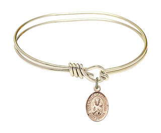 5 3/4 inch Oval Eye Hook Hamilton Gold Bangle Bracelet with a 14kt Gold Filled Our Lady of Czestochowa charm.