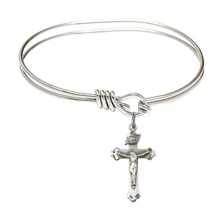 5 3/4 inch Oval Eye Hook Rhodium Bangle Bracelet with a Sterling Silver Crucifix charm.
