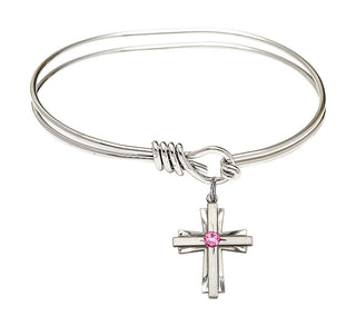 5 3/4 inch Oval Eye Hook Rhodium Bangle Bracelet with a Sterling Silver Cross charm.