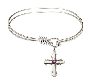 5 3/4 inch Oval Eye Hook Rhodium Bangle Bracelet with a Sterling Silver Cross charm.