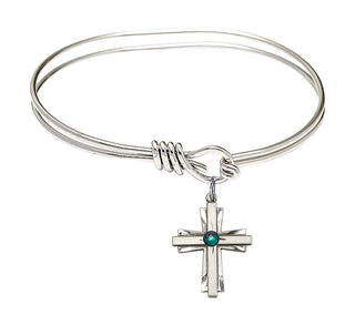 5 3/4 inch Oval Eye Hook Rhodium Bangle Bracelet with a Sterling Silver Cross charm.