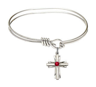 5 3/4 inch Oval Eye Hook Rhodium Bangle Bracelet with a Sterling Silver Cross charm.