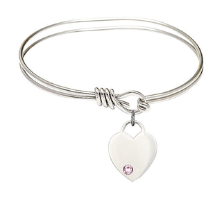 5 3/4 inch Oval Eye Hook Rhodium Bangle Bracelet with a Sterling Silver Heart charm. Engraved Catholic Saint Jewelry