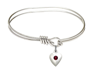 5 3/4 inch Oval Eye Hook Rhodium Bangle Bracelet with a Sterling Silver Heart charm.