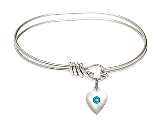 5 3/4 inch Oval Eye Hook Rhodium Bangle Bracelet with a Sterling Silver Heart charm.