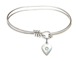 5 3/4 inch Oval Eye Hook Rhodium Bangle Bracelet with a Sterling Silver Heart charm.