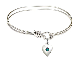 5 3/4 inch Oval Eye Hook Rhodium Bangle Bracelet with a Sterling Silver Heart charm.