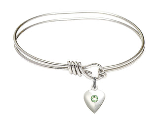 5 3/4 inch Oval Eye Hook Rhodium Bangle Bracelet with a Sterling Silver Heart charm.