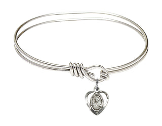 5 3/4 inch Oval Eye Hook Rhodium Bangle Bracelet with a Sterling Silver Scapular charm.