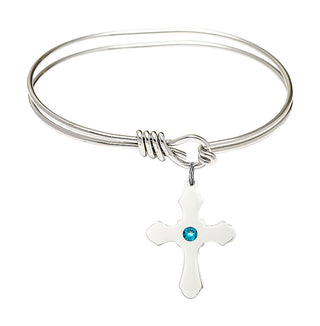 5 3/4 inch Oval Eye Hook Rhodium Bangle Bracelet with a Sterling Silver Cross charm.