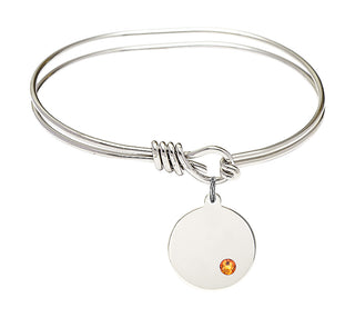 5 3/4 inch Oval Eye Hook Rhodium Bangle Bracelet with a Sterling Silver Plain Disc charm.