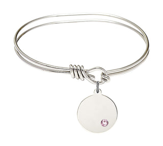 5 3/4 inch Oval Eye Hook Rhodium Bangle Bracelet with a Sterling Silver Plain Disc charm.