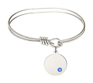 5 3/4 inch Oval Eye Hook Rhodium Bangle Bracelet with a Sterling Silver Plain Disc charm.