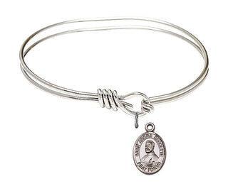 5 3/4 inch Oval Eye Hook Rhodium Bangle Bracelet with a Sterling Silver Saint Andre Bessette charm. Engraved Catholic Saint Jewelry