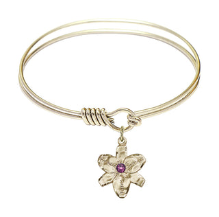 6 1/4 inch Round Eye Hook Hamilton Gold Bangle Bracelet with a 14kt Gold Filled Chastity charm.