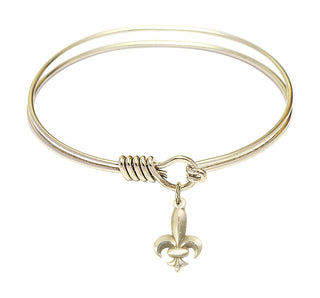 6 1/4 inch Round Eye Hook Hamilton Gold Bangle Bracelet with a 14kt Gold Filled Fleur de Lis charm.