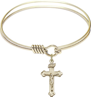 Bangle Bracelet with a Crucifix charm.
