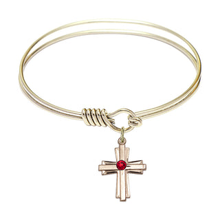 6 1/4 inch Round Eye Hook Hamilton Gold Bangle Bracelet with a 14kt Gold Filled Cross charm.