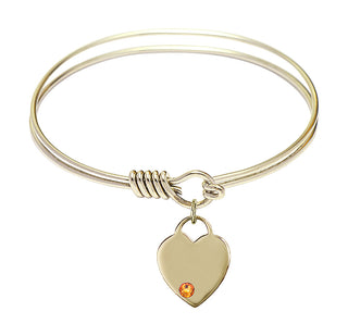 6 1/4 inch Round Eye Hook Hamilton Gold Bangle Bracelet with a 14kt Gold Filled Heart charm. Engraved Catholic Saint Jewelry