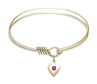 6 1/4 inch Round Eye Hook Hamilton Gold Bangle Bracelet with a 14kt Gold Filled Heart charm.