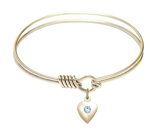 6 1/4 inch Round Eye Hook Hamilton Gold Bangle Bracelet with a 14kt Gold Filled Heart charm.