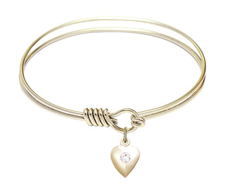 6 1/4 inch Round Eye Hook Hamilton Gold Bangle Bracelet with a 14kt Gold Filled Heart charm.