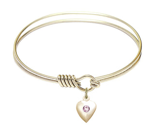 6 1/4 inch Round Eye Hook Hamilton Gold Bangle Bracelet with a 14kt Gold Filled Heart charm.