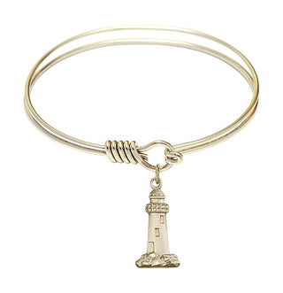 6 1/4 inch Round Eye Hook Hamilton Gold Bangle Bracelet with a 14kt Gold Filled Lighthouse charm.