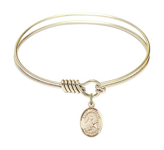 6 1/4 inch Round Eye Hook Hamilton Gold Bangle Bracelet with a 14kt Gold Filled Saint Theresa charm. Engraved Catholic Saint Jewelry